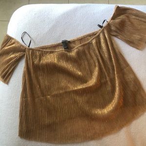 Off the shoulder gold shirt